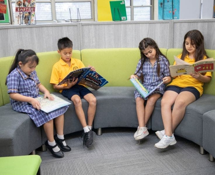 Student enjoying books in our school library.