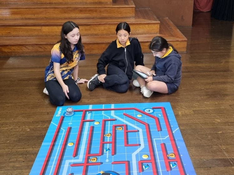 Students using digital technology.